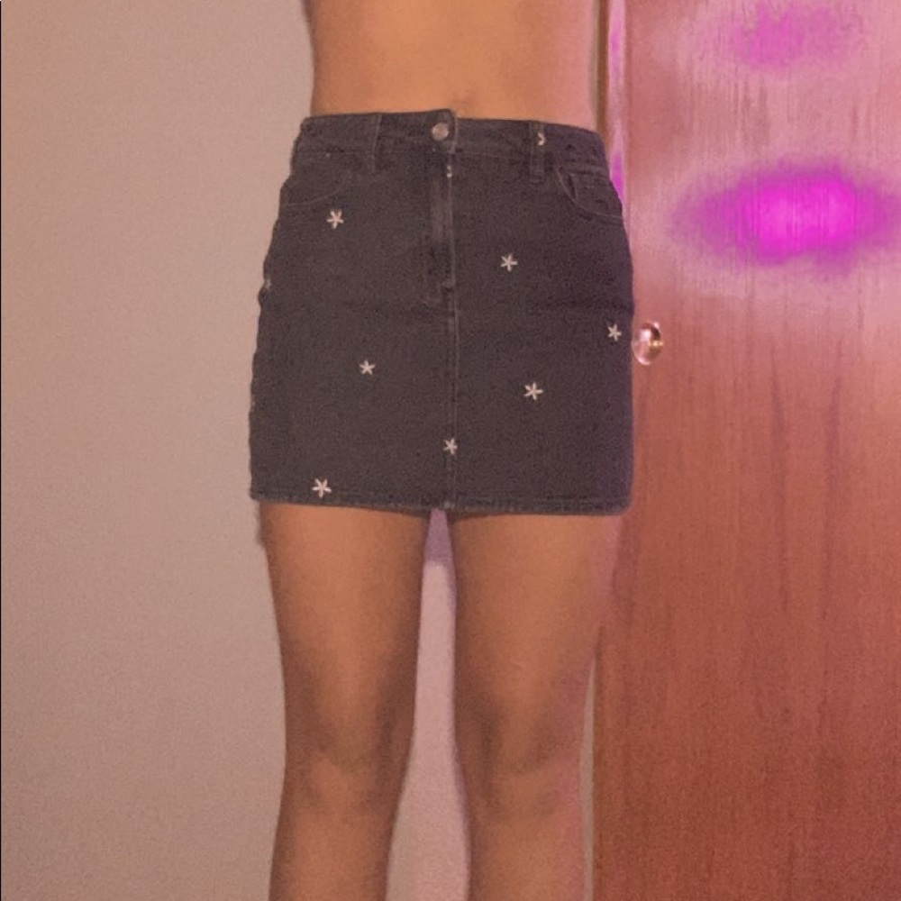 black denim skirt with daisy detail